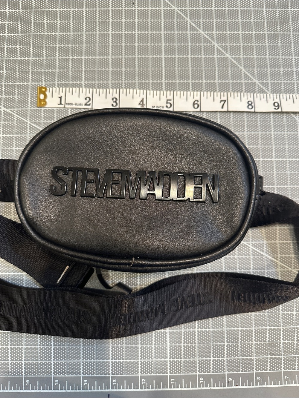 Steve Madden Black fanny pack Belt Bag with Embossed Logo